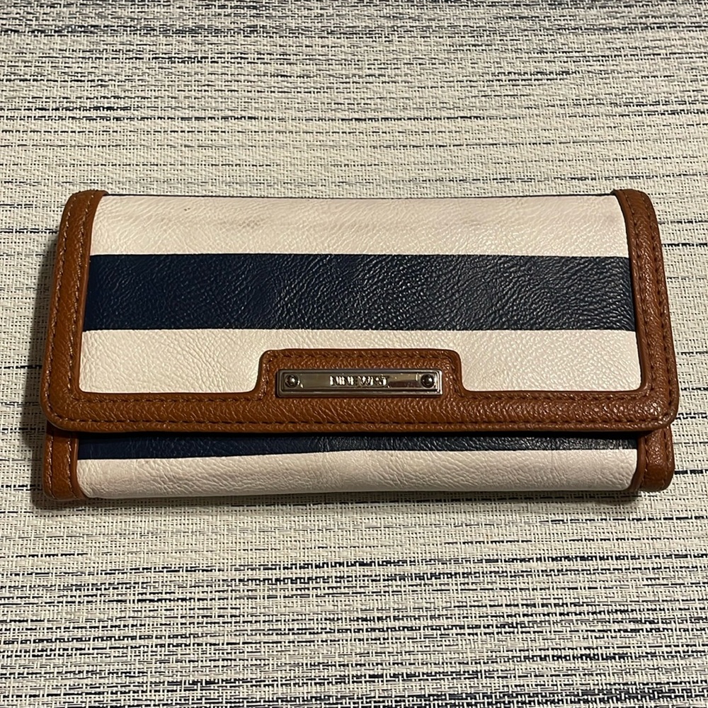 Nine West trifold wallet leather navy blue & white w/ snap closure.